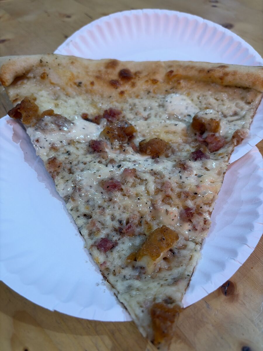 Chicken bacon ranch slice on a paper plate at Spinelli's